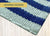 Teal and Blue Striped Woven Accent Rug – 24x36 Coastal Layering Rug for Porch or Entryway
