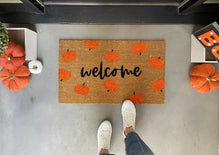 https://nickel-designs.com/cdn/shop/products/doormat-fall-doormat-with-pumpkin-pattern-1_219x.progressive.jpg?v=1687984417