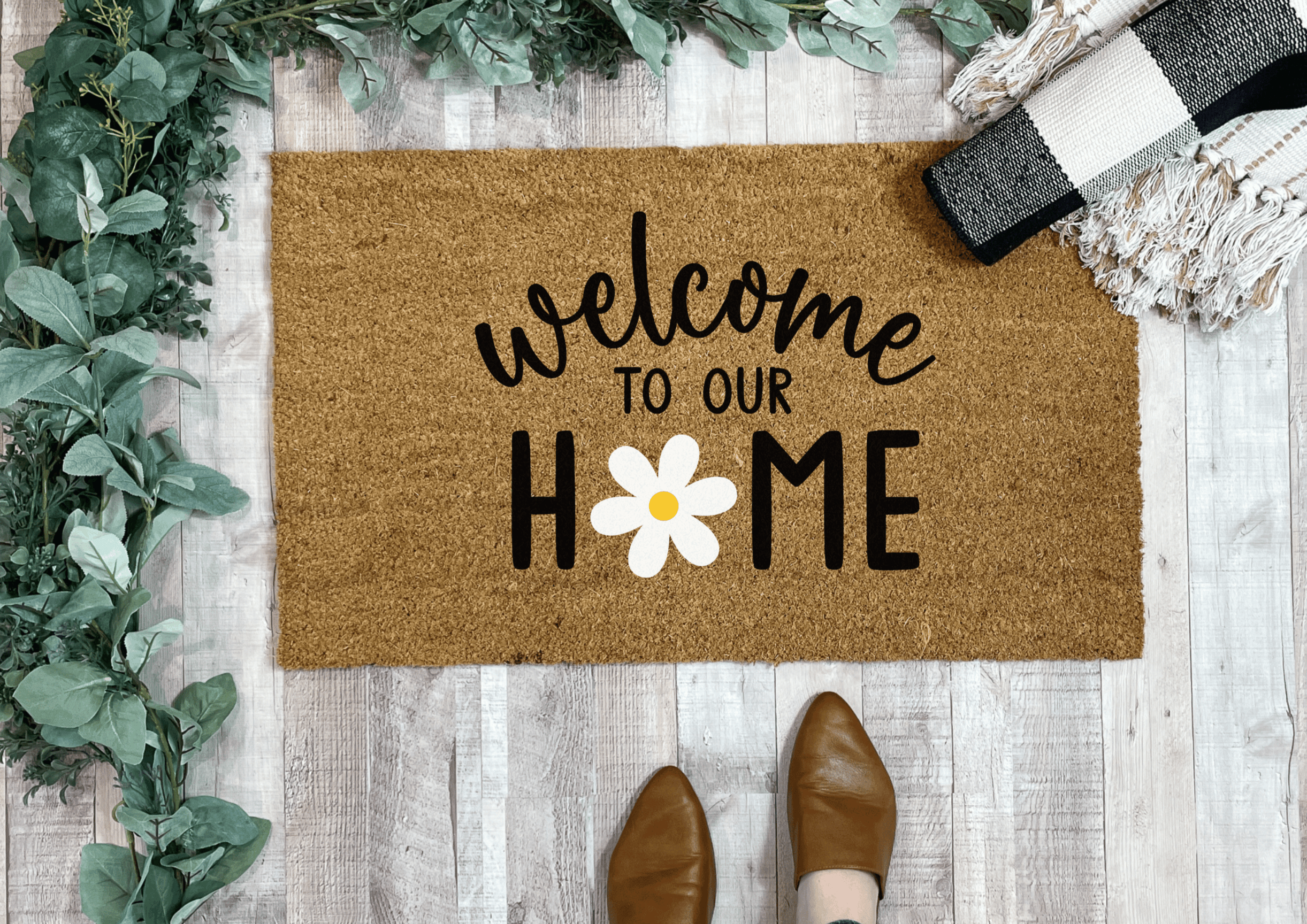 https://nickel-designs.com/cdn/shop/products/doormat-welcome-to-our-home-daisy-flower-doormat-1@2x.png?v=1680754533