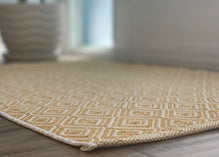 https://nickel-designs.com/cdn/shop/products/rug-boho-woven-doormat-layering-rug-mustard-3_219x.progressive.jpg?v=1624307229