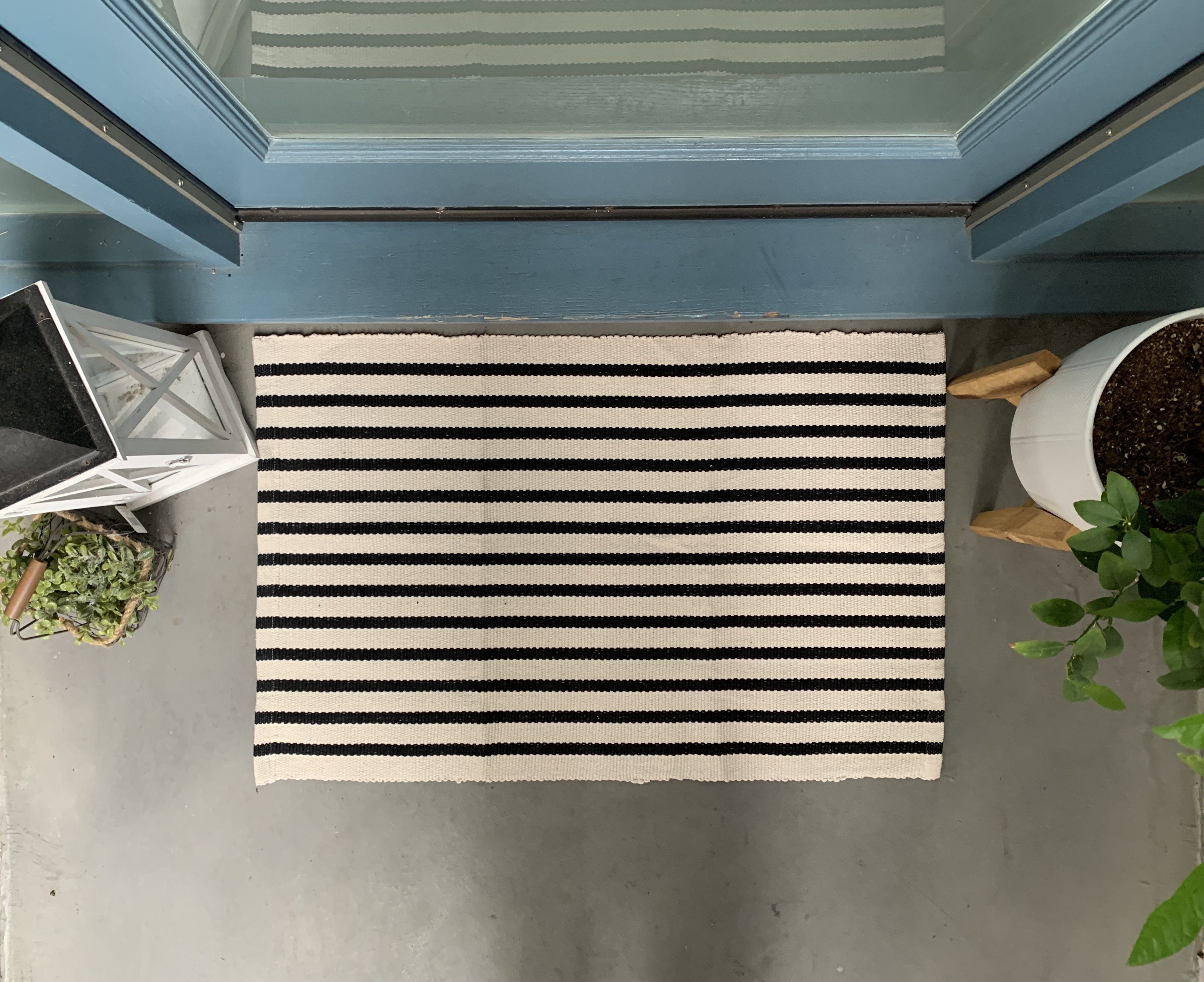 https://nickel-designs.com/cdn/shop/products/rug-striped-doormat-layering-rug-2@2x.jpg?v=1624306668